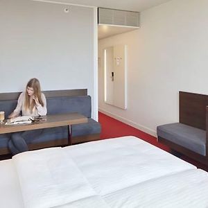 Kamer met een King Size Bed en Uitzicht op de Rivier